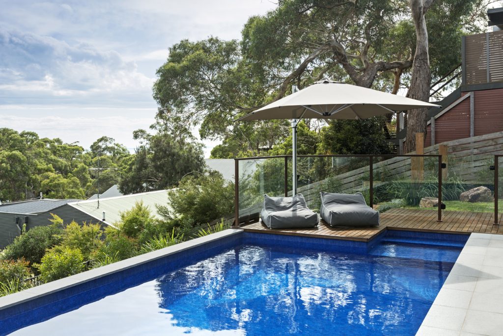 swimming pool above ground with decking