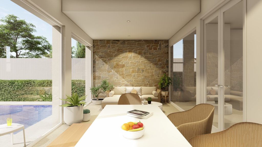 alfresco room with dining table and sofa, stone wall feature
