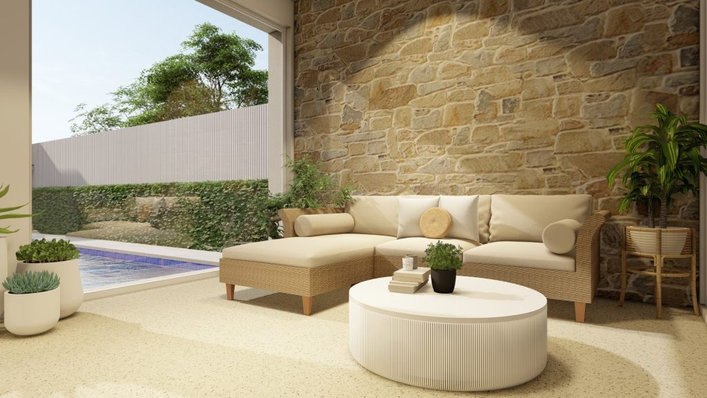 Alfresco area with sofa and stone wall