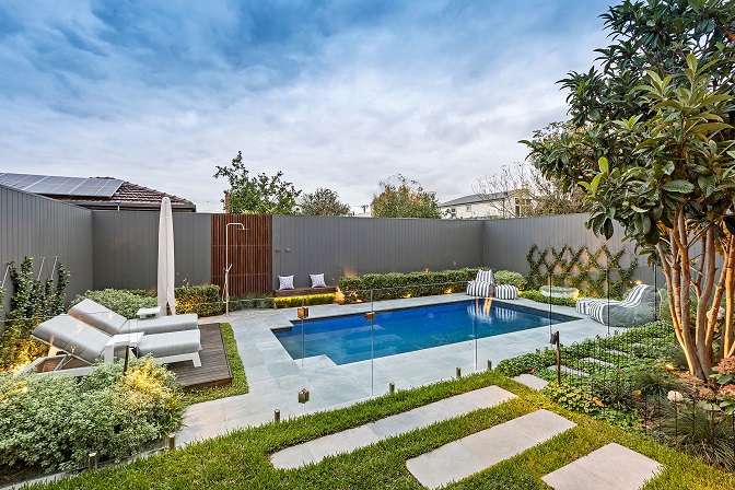 pool and sunbeds with wires for plants